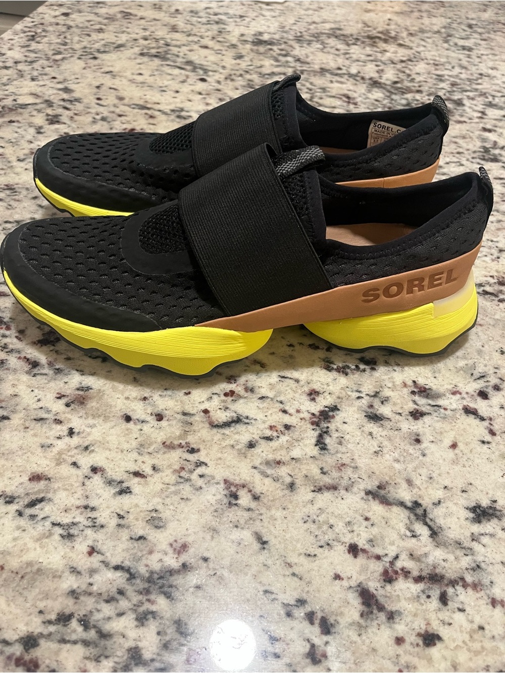 SOREL Women’s Kinetic Black & Yellow Slip-On Athletic Sneakers